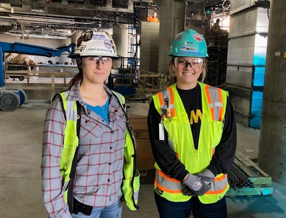 Two women on a construction site