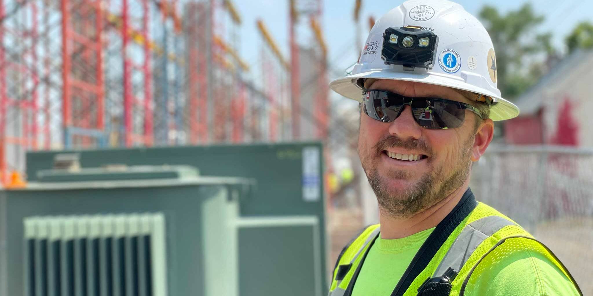 Construction worker smiling at camera